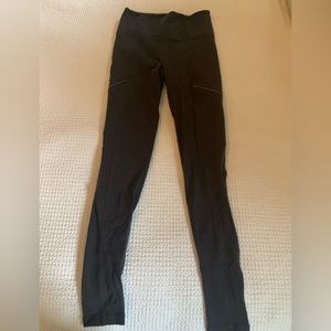 Athleta leggings with zip pocket sides